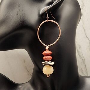 Handmade boho-style earrings, Batik bone bead, coral, and copper.